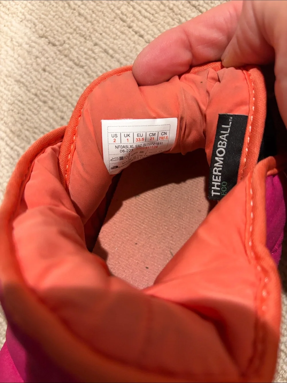 The North Face Kids Pink and Orange Puffy Slip-On Slippers